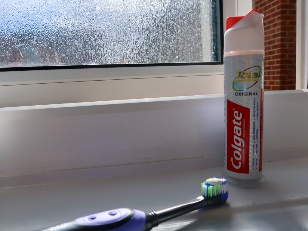 toothpaste on bathroom windowsill